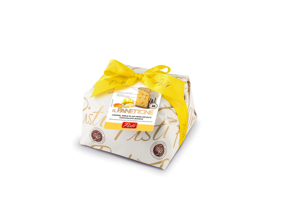 Panettone van citroen en honing bedekt met witte chocolade